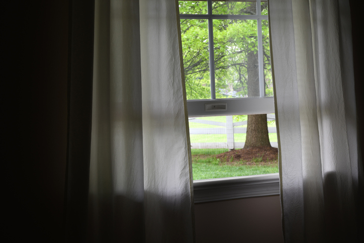 Open window with a breeze blowing through.